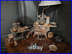 2 Vintage Crescent Cast Iron Miniature Stoves With Accessories Salesman Lamp