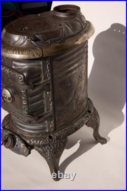 Antique 1897 Wood Stove Umpire Estate C Cast Iron Upright Hamilton F. L. Kahn