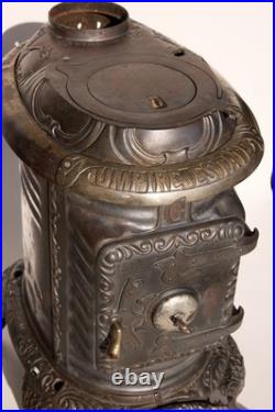 Antique 1897 Wood Stove Umpire Estate C Cast Iron Upright Hamilton F. L. Kahn