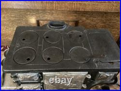 Antique Midget Cast Iron Toy Stove Salesman Sample Range Cooks Accessories Lot