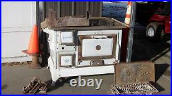 Antique Wood Burning Cook Stove, a couple flaws, mostly good condition