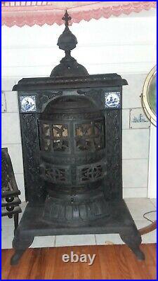 Antique cast iron franklinite parlor stove