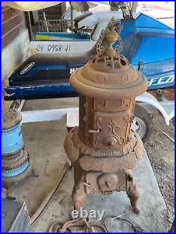 Antique cast iron pot belly stove