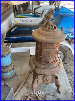 Antique cast iron pot belly stove