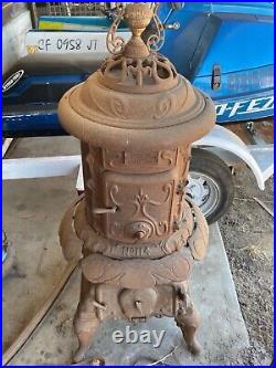 Antique cast iron pot belly stove