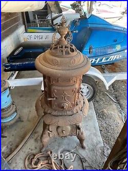 Antique cast iron pot belly stove