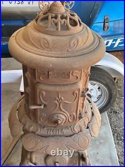 Antique cast iron pot belly stove