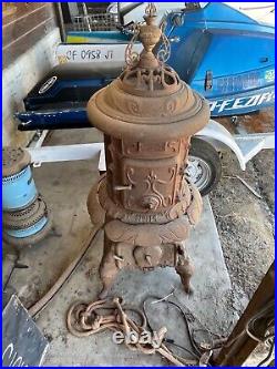 Antique cast iron pot belly stove