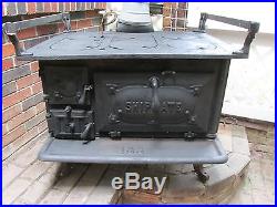 Antique cast iron stove shipmate 135