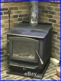 Cast Iron wood stove with residual burn off. 24wx25dx27h extra legs Thick Glass