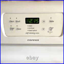 Gas Tappan White Stove Measures 30x25x35 With 4 Burners & 2 oven racks & clock