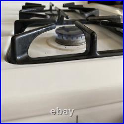 Gas Tappan White Stove Measures 30x25x35 With 4 Burners & 2 oven racks & clock