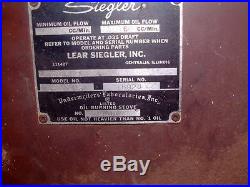 Heater, Stove, Large Porcelain Cast Iron by Siegler, Illinois. Oil or Kerosene