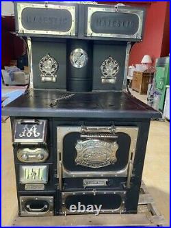 Re-plated and completely refurbished vintage Majestic Wood Stove