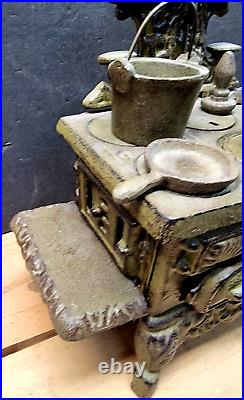 Vintage CRESCENT Cast Iron stove with accessories