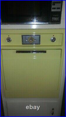 Vintage General Electric Oven, Stove, and over head fan