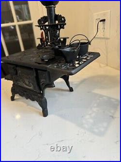 Vintage MINIATURE CAST-IRON STOVE CRESCENT Toy With A Lamp Vintage MINIATURE CAST-IRON STOVE CRESCENT Toy With A Lamp