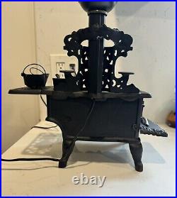 Vintage MINIATURE CAST-IRON STOVE CRESCENT Toy With A Lamp Vintage MINIATURE CAST-IRON STOVE CRESCENT Toy With A Lamp