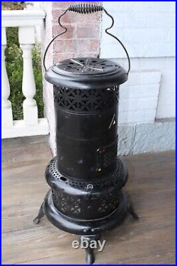 Vintage Perfection Heater/Parlor Stove with insert Nice