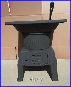 Vintage cast iron 20s to early 30s Montgomery Ward wood stove,' half pot belly