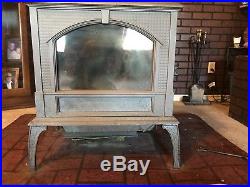 Wood Burning Soapstone Stove with view of fire